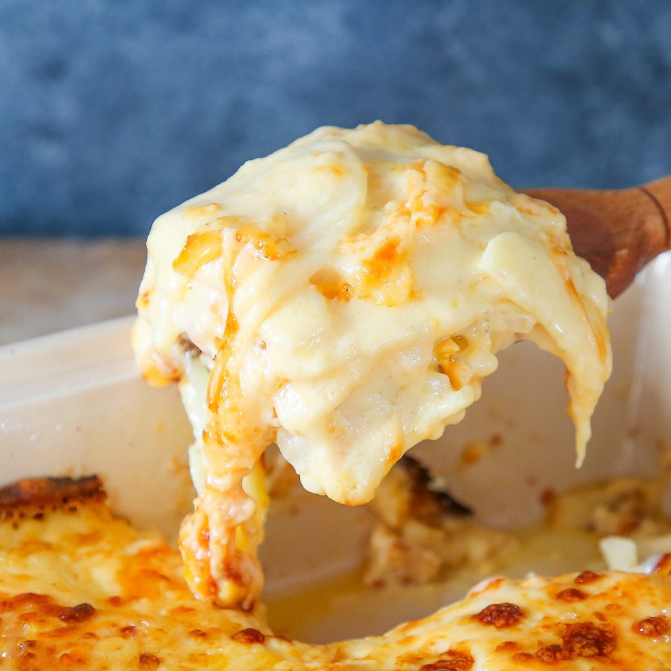 Cheesy Scalloped Potatoes beside the Main Plate