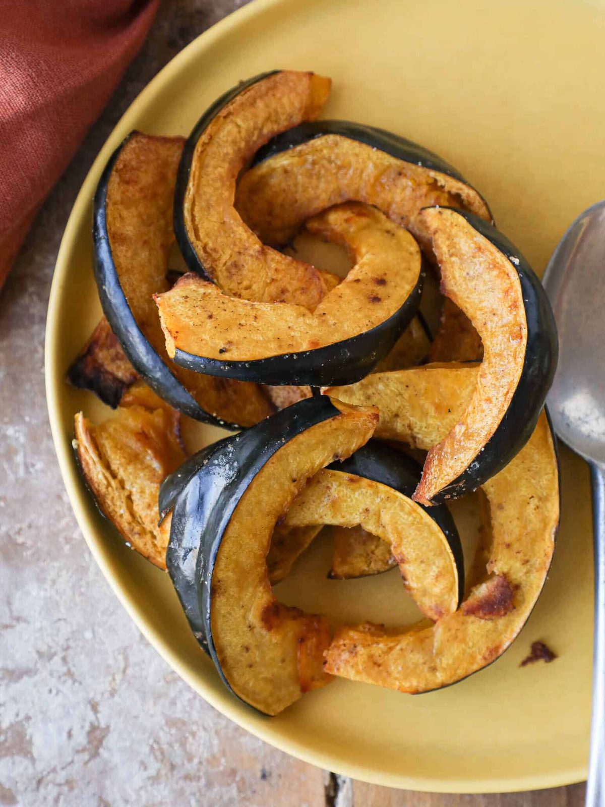 Roasted Acorn Squash Slices beside the Main Plate