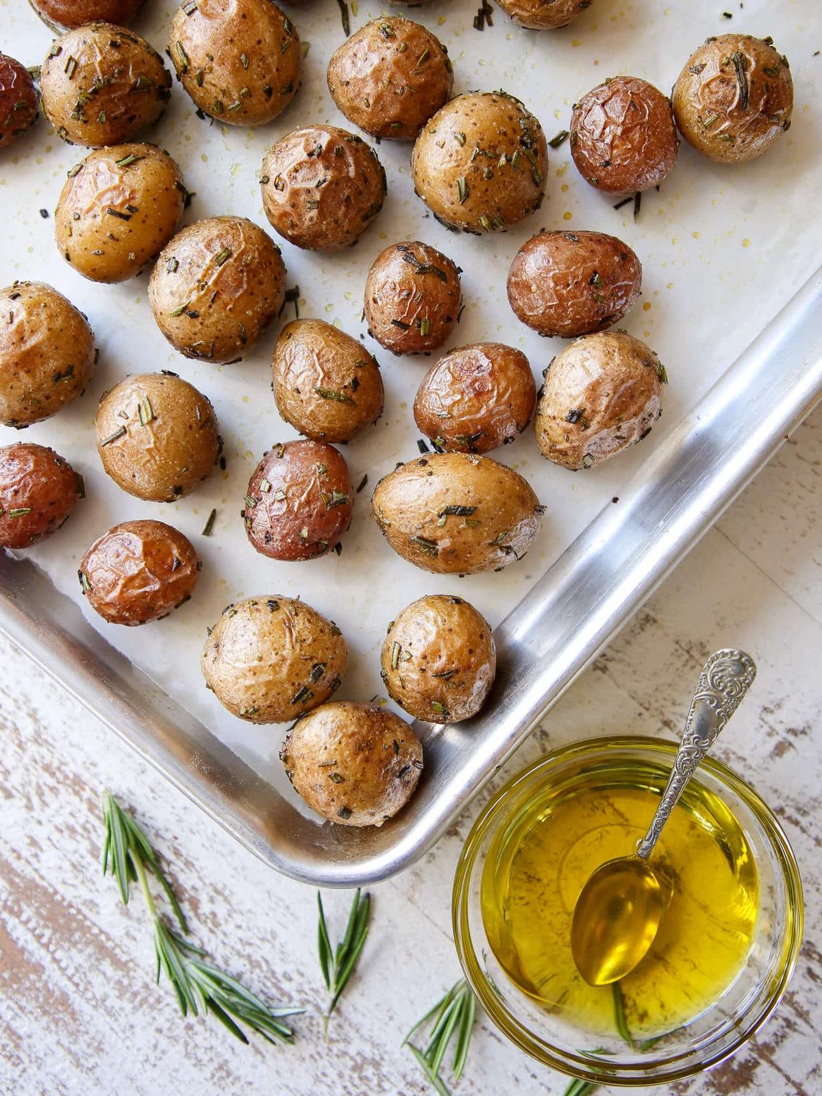 Roasted Rosemary Potatoes beside the Main Plate