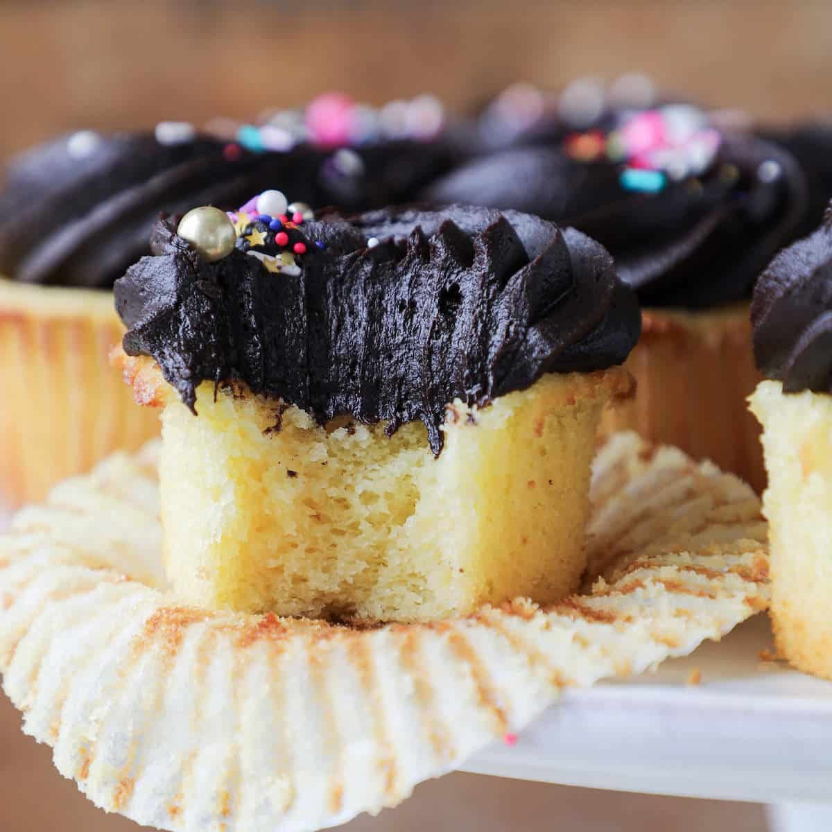 Yellow Cupcakes with Chocolate Frosting for a Smooth Finish