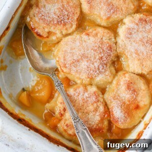 Old Fashioned Peach Cobbler baked vintage spoon serving