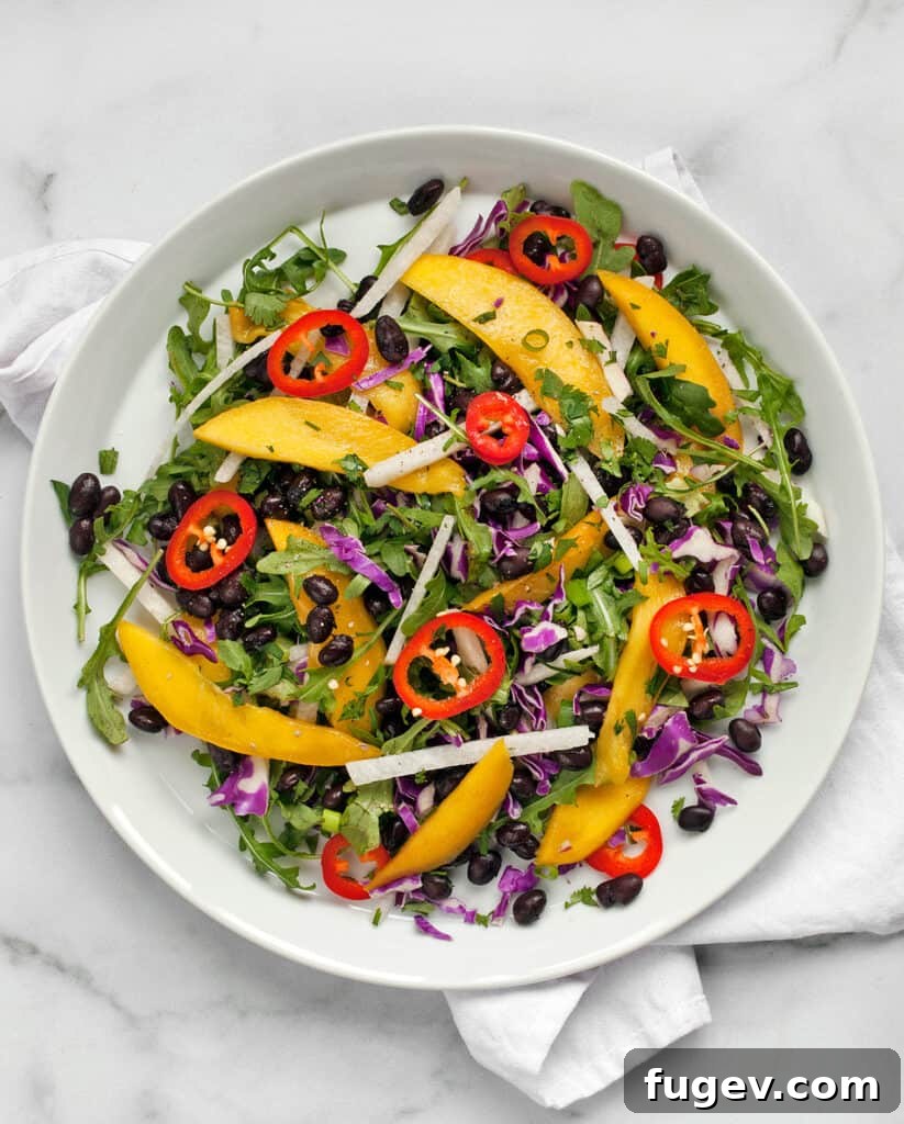 Tropical Mango Jicama Black Bean Medley 2 Vibrant Mango Jicama Black Bean Salad with fresh cilantro and chilies