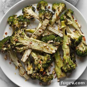 Lemon grilled broccoli on a plate.