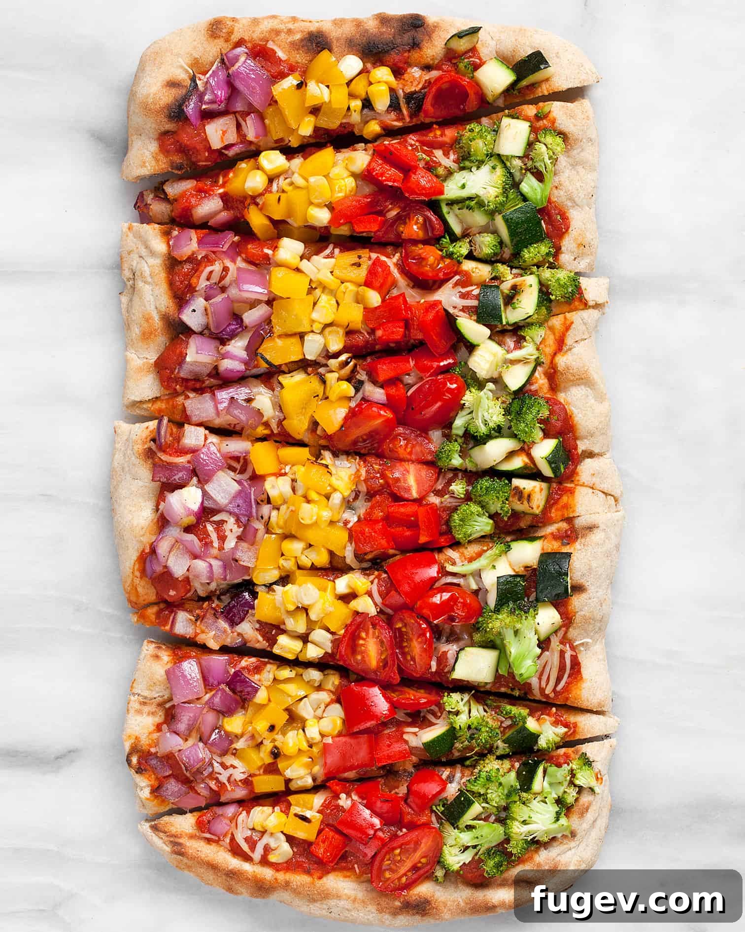 Flame-Kissed Vegetable Medley Pizza 2 Grilled Rainbow Veggie Pizza, a vibrant and healthy homemade pizza topped with colorful vegetables.