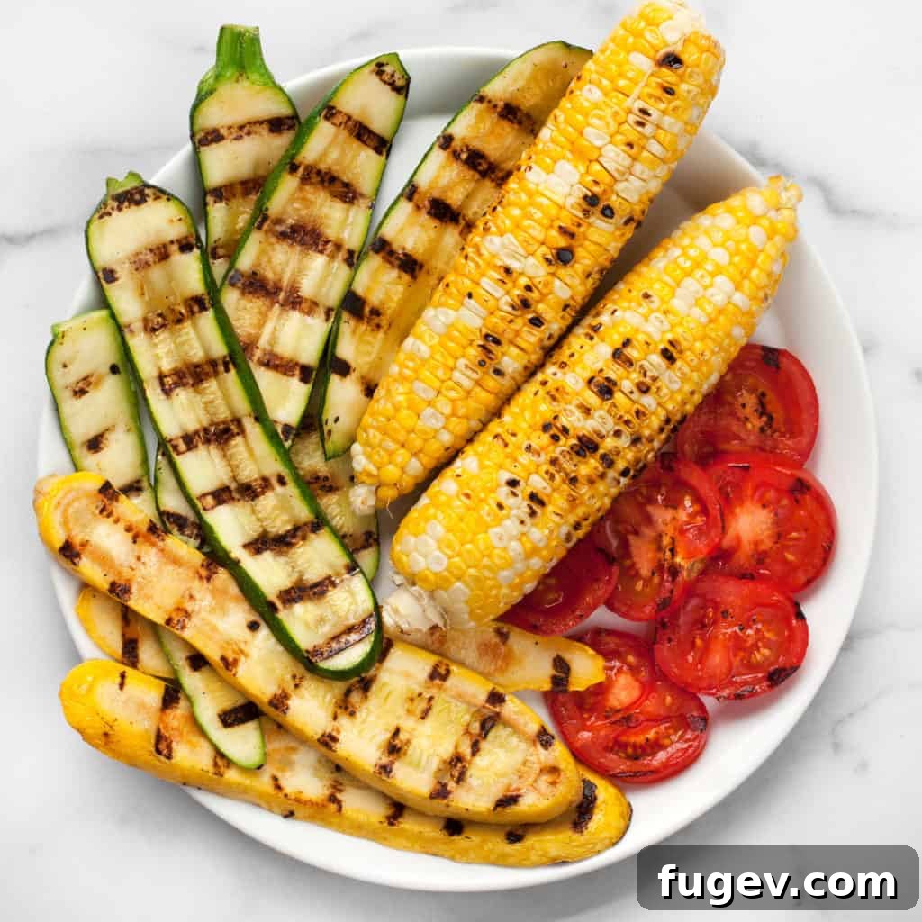 No Grill? Perfectly Grilled Vegetables on Your Stovetop 3 Grilled zucchini, squash, corn and tomatoes on a plate
