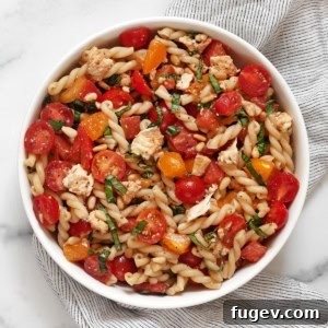Bruschetta Inspired Pasta Salad 7 A bowl of Bruschetta Pasta Salad, highlighting the fresh ingredients and inviting colors.