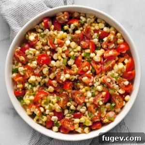 Vibrant Summer Corn and Tomato Salad 6 Fresh corn and tomato salad in a bowl, ready to serve.