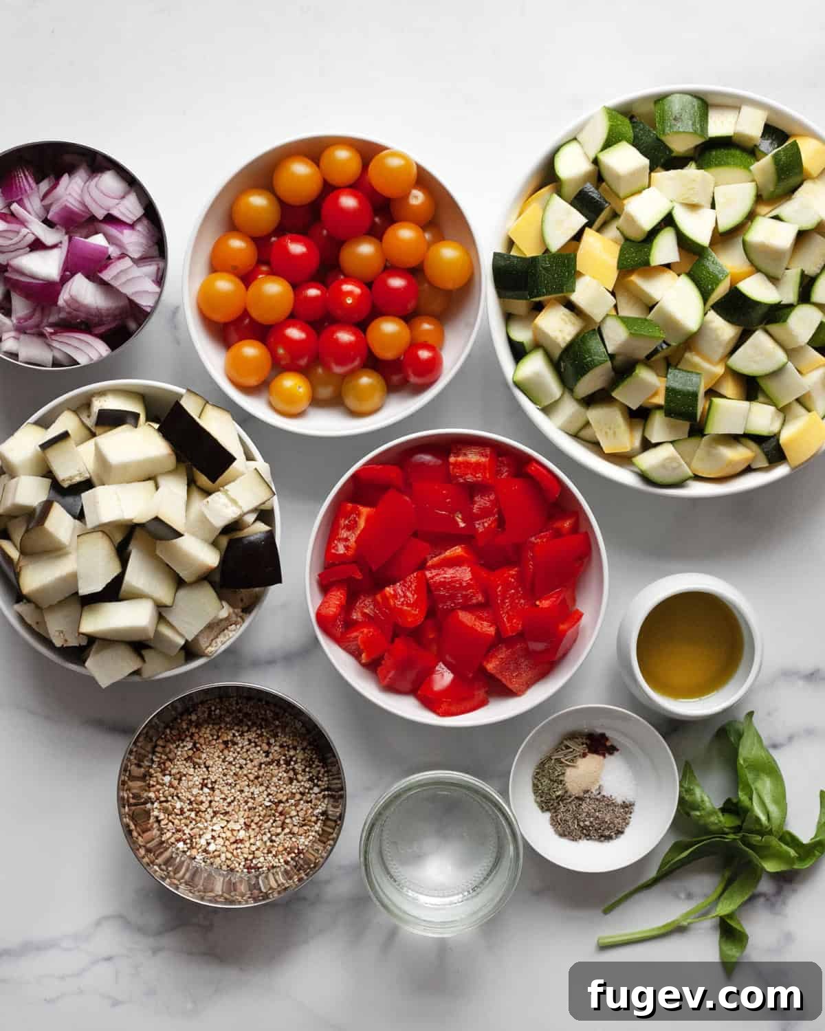Sun-Kissed Ratatouille & Quinoa Medley 3 Assorted fresh vegetables including ripe tomatoes, vibrant zucchini, yellow squash, purple eggplant, red onions, and colorful bell peppers, alongside a bowl of dried spices, olive oil, uncooked quinoa, and fresh basil leaves, all laid out for preparation.