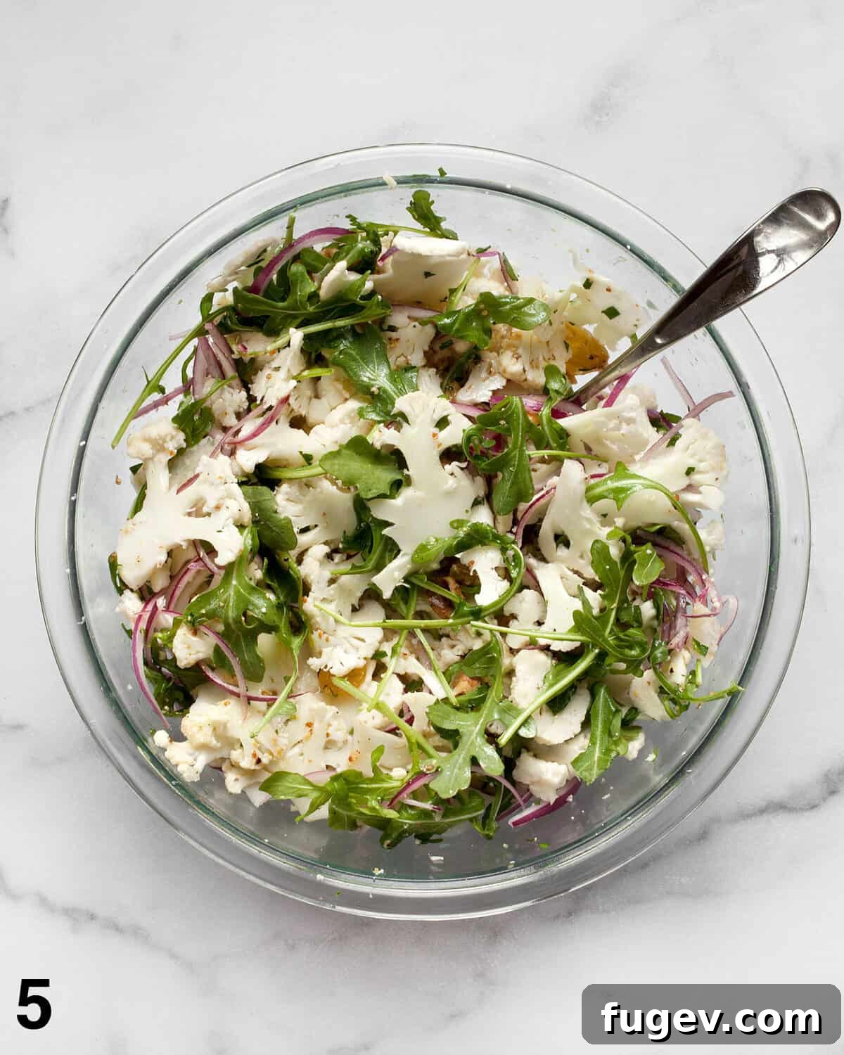 Crisp Cauliflower Salad with Walnuts and Tangy Pickled Raisins 6 Vinaigrette stirred into cauliflower salad.