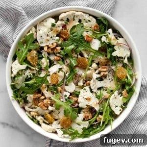 Shaved cauliflower salad in a bowl.