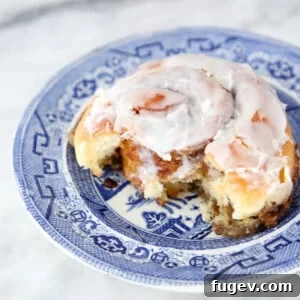Deliciously soft and gooey sourdough cinnamon rolls, freshly baked and ready to enjoy.