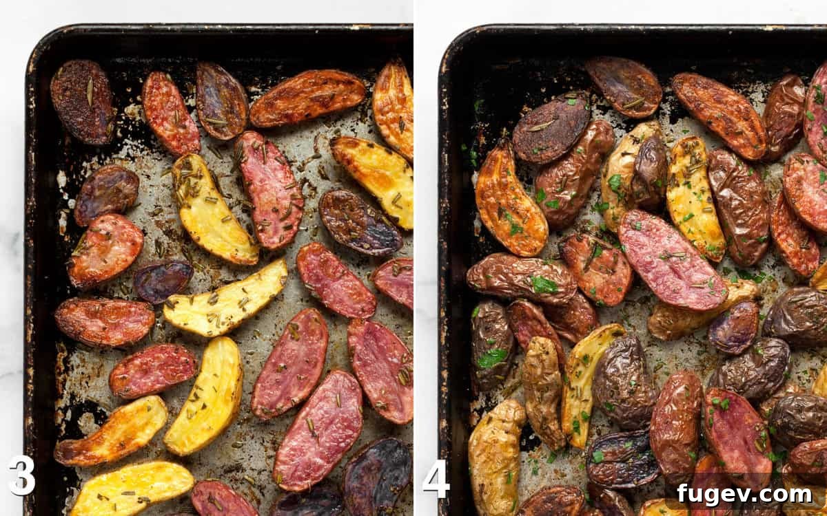 Finished Roasted Potatoes with Parsley Close-up of golden brown roasted potatoes on a sheet pan, garnished with fresh chopped parsley.