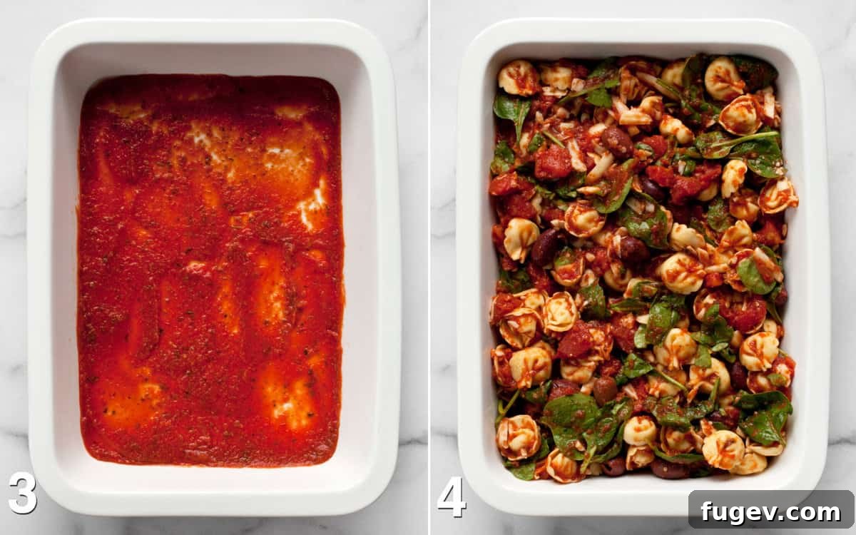 Mediterranean Tortellini Bake 5 The baking dish with a base layer of marinara sauce. Below it, the tortellini, olives, and spinach mixture has been transferred into the dish.