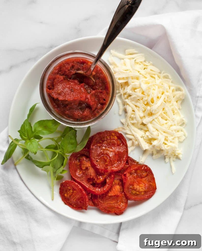Crispy Grilled Pizza Delights 5 Ingredients for grilled pizza: fresh tomato sauce, shredded mozzarella cheese, roasted tomatoes, and basil leaves.