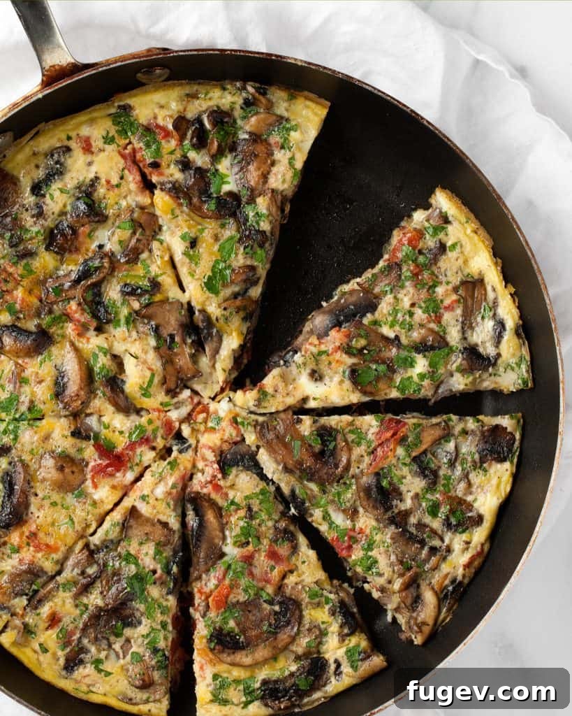 Savory Mushroom and Tomato Frittata 4 Sliced frittata with mushrooms and tomatoes
