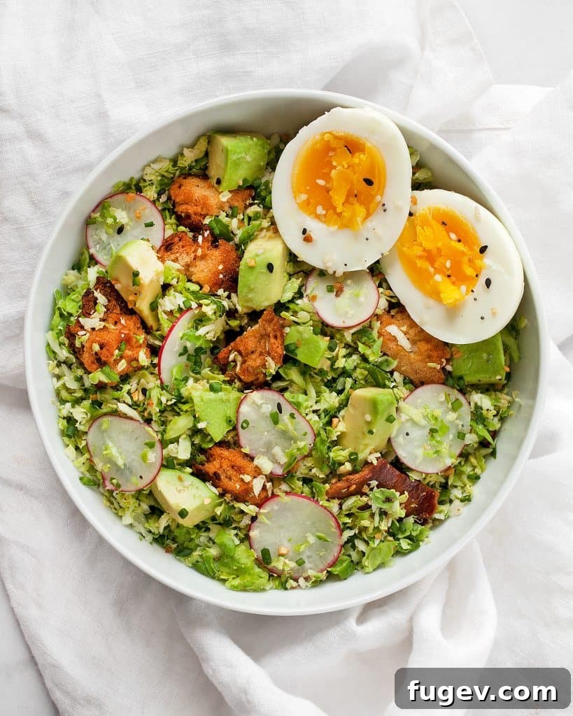 Sunrise Sprout Salad 4 Brussels sprout salad topped with perfectly cooked eggs and fresh avocado slices