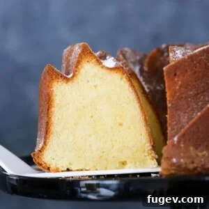 Sour Cream Pound Cake slice on cake server.