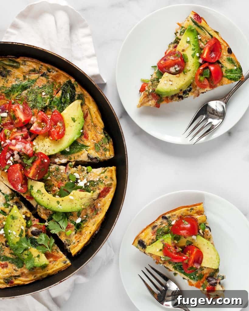 Hearty Roasted Pepper and Black Bean Frittata 3 A close-up shot of a sliced Black Bean Roasted Pepper Frittata, showcasing the vibrant black beans, roasted peppers, and greens within its fluffy egg base.