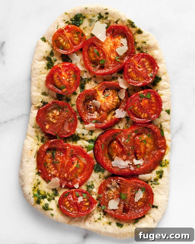 Sun-Kissed Oven Roasted Tomatoes 4 Roasted tomatoes topping a pesto pizza