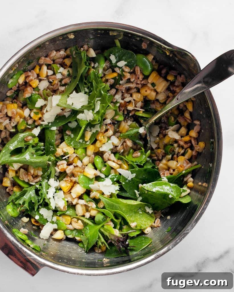 Charred Corn and Fava Farro Salad 6 Stir together the farro, corn, fava beans and greens