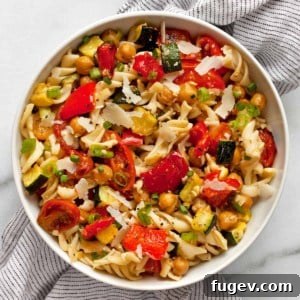 Roasted vegetable chickpea pasta salad in a bowl.
