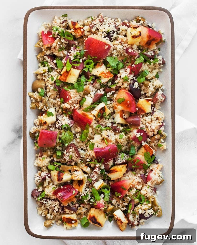 Vibrant Grilled Nectarine Halloumi Couscous 4 Grilled Nectarine Halloumi Couscous, highlighting the golden grilled halloumi and caramelized nectarines