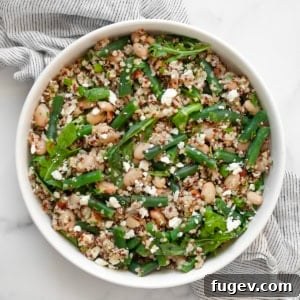 Green Bean Quinoa Bowl with White Beans and Toasted Almonds 8 Green bean quinoa in a bowl.