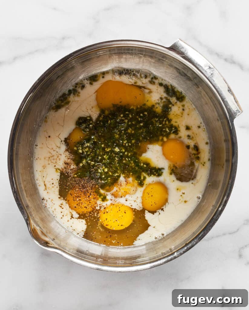 Pesto-Infused Tomato and Kale Frittata 5 Whisk together the eggs, milk and pesto for the frittata