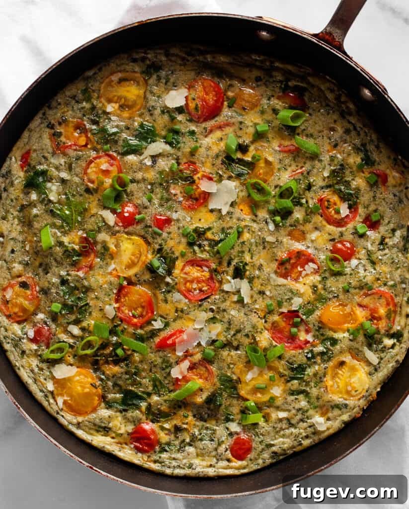 Pesto-Infused Tomato and Kale Frittata 6 Vegetarian frittata with tomatoes and kale