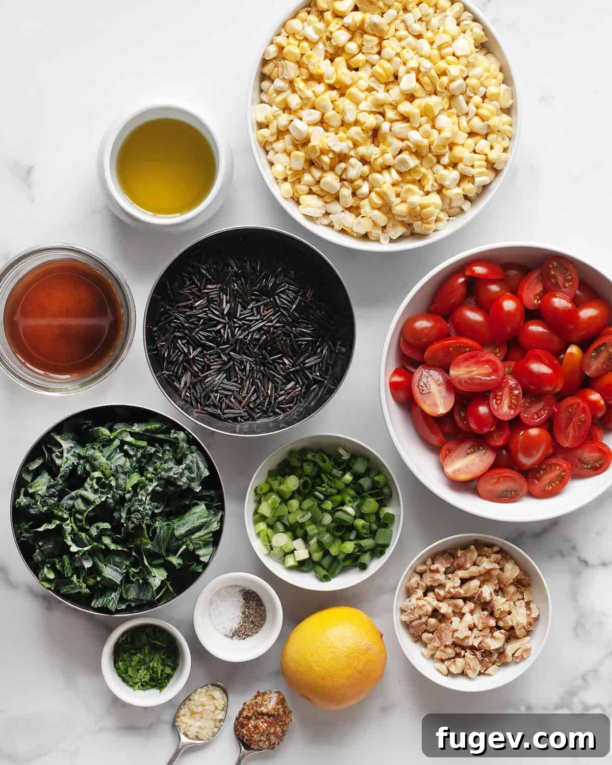 Vibrant Roasted Corn and Tomato Wild Rice Salad 3 Ingredients for wild rice salad including corn, tomatoes, wild rice, scallions, walnuts, parsley, olive oil, garlic, lemon, red wine vinegar, salt and pepper laid out.