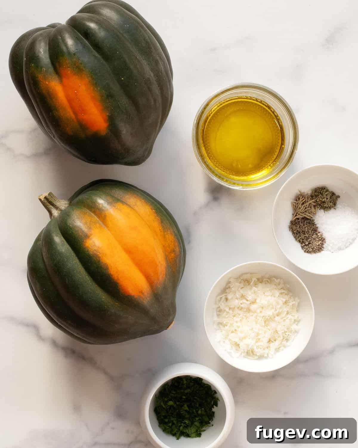 Golden Parmesan Roasted Acorn Squash 3 Ingredients including acorn squash, parmesan, spices and parsley.