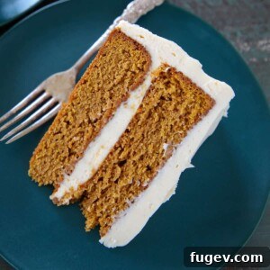 Pumpkin Spice Layer Cake slice on plate.