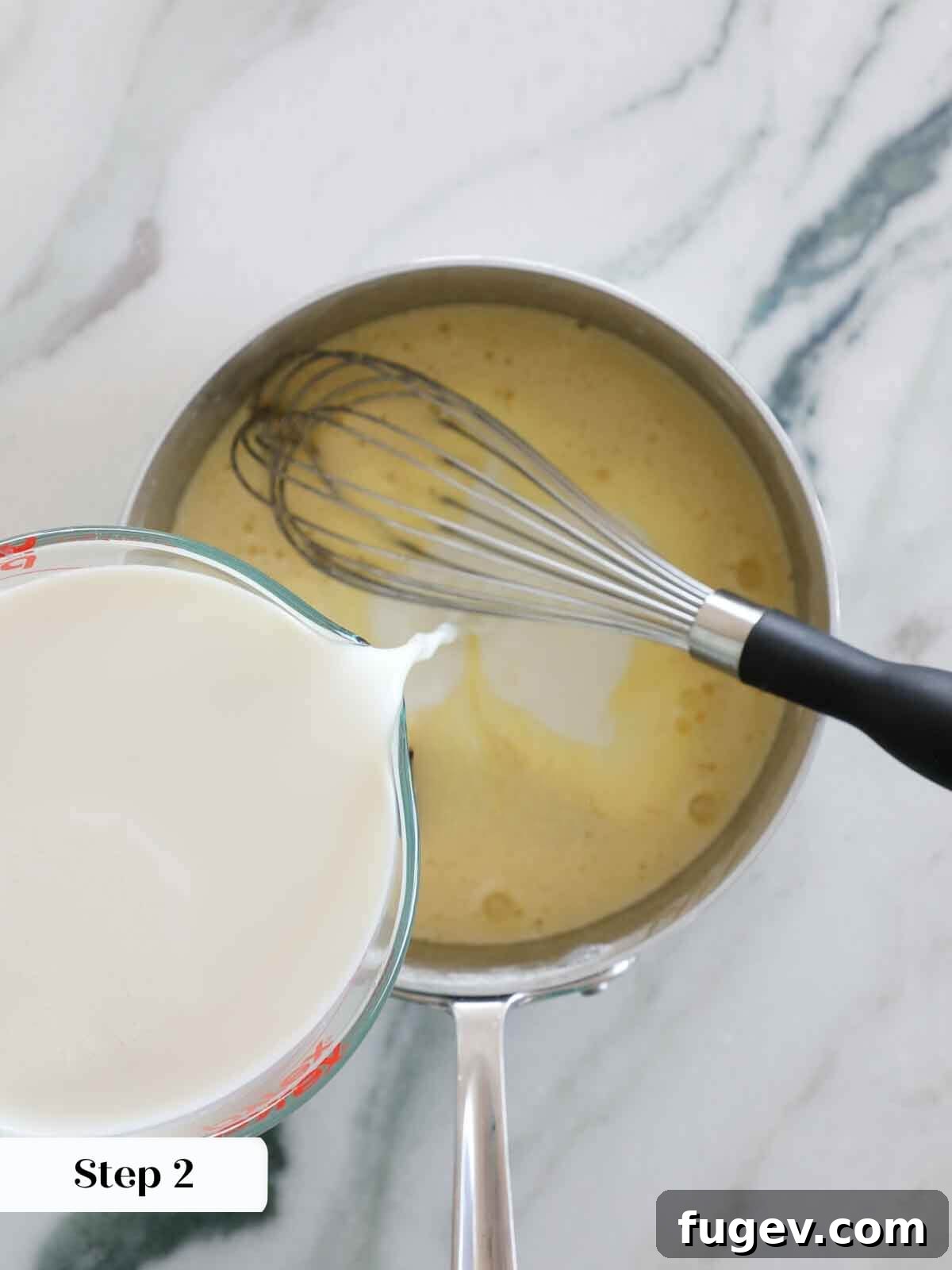 Decadent Caramel Pudding 6 Slowly whisking milk into the egg and sugar mixture in a saucepan to create a smooth pudding base.