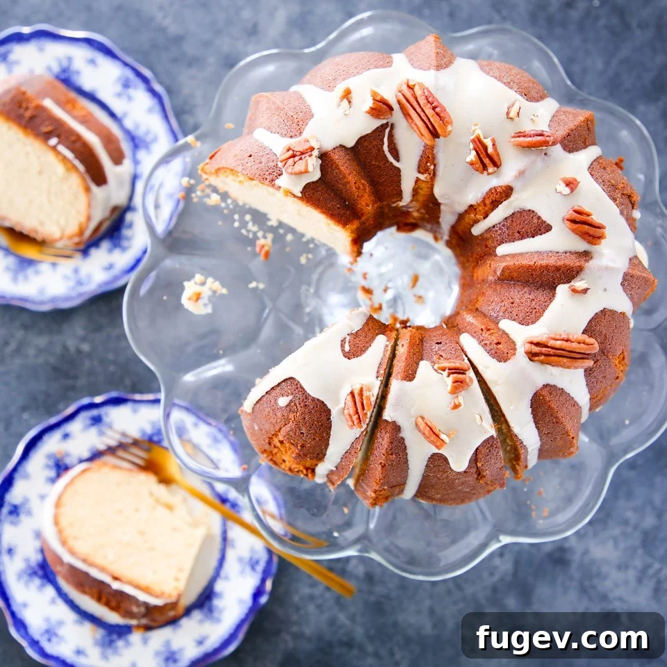 Double Maple Bliss 2 Rich Maple Pound Cake with Maple Glaze and toasted pecans, ready to be served