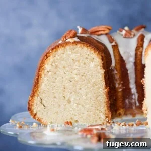 Maple Pound Cake with maple glaze sliced, showcasing its moist texture and perfect crumb