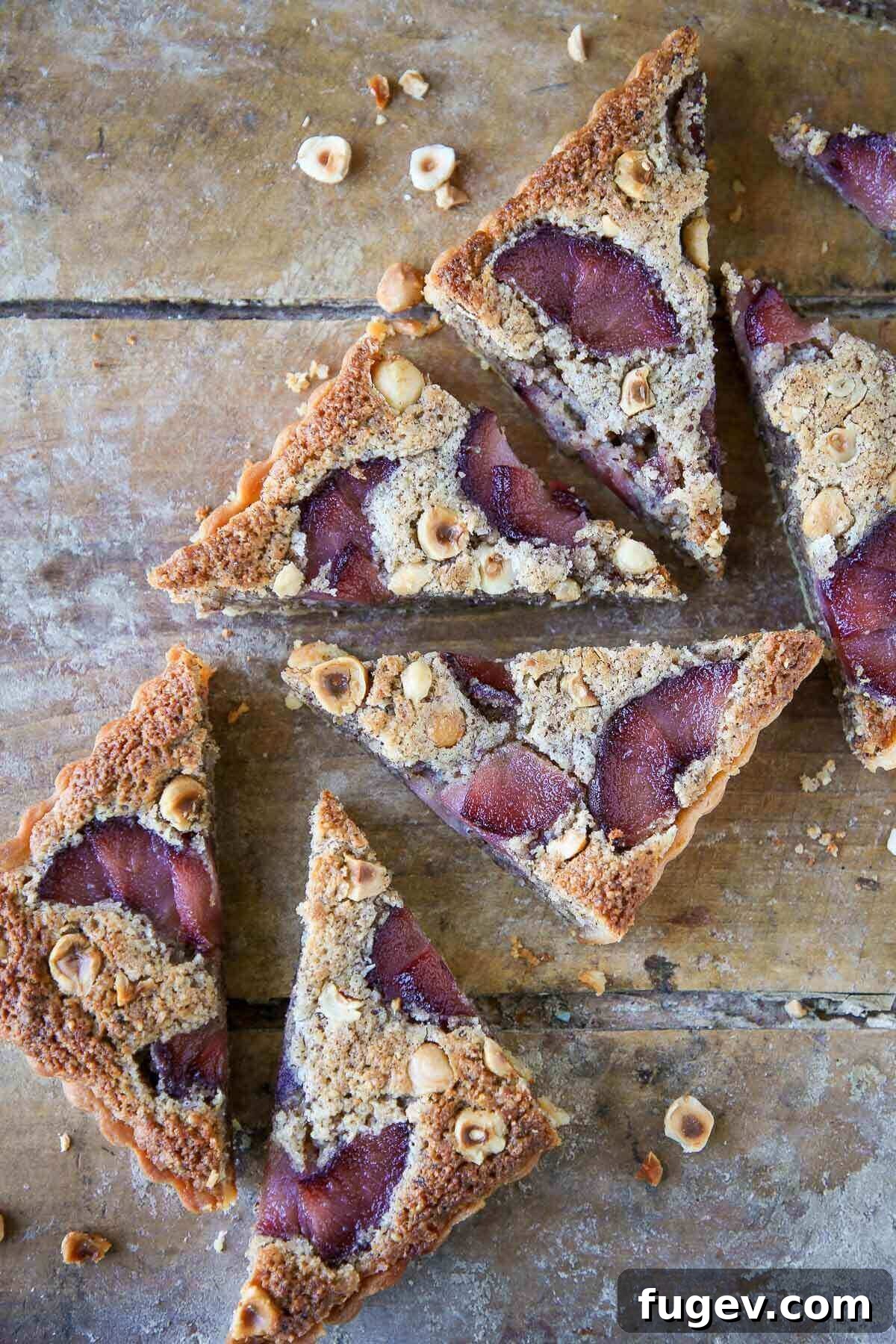Sweet Tart Dough 4 Hazelnut pear tart set in a sweet tart crust, showcasing the pastry's perfect edge.