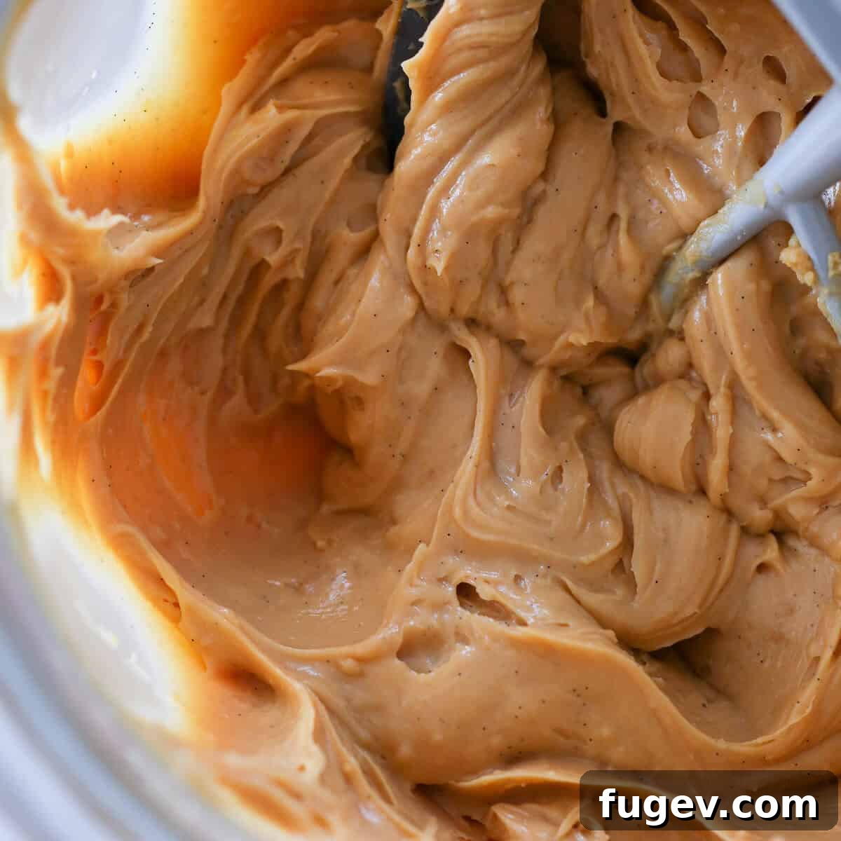 Velvet Caramel Cream 2 Smooth and creamy Caramel Pastry Cream in a bowl with a paddle attachment, ready for use