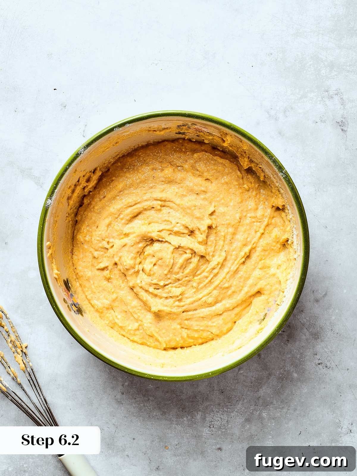 Southern Cornbread Perfection 11 The finished cornbread batter in a mixing bowl, displaying its smooth, creamy, and consistent texture before being poured into the pan.