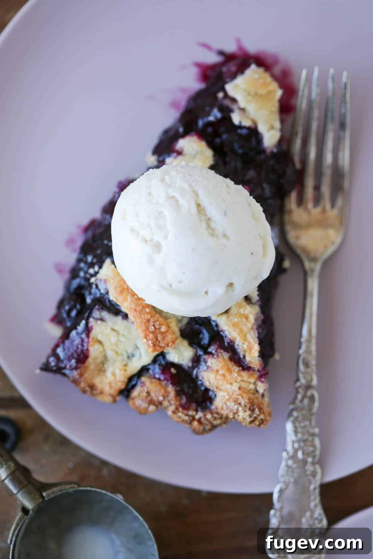 Classic Thanksgiving Dinner Recipes and Full Menu 24 A juicy slice of blueberry pie with a golden lattice top, from the '20 Best Thanksgiving Pie Recipes' collection.
