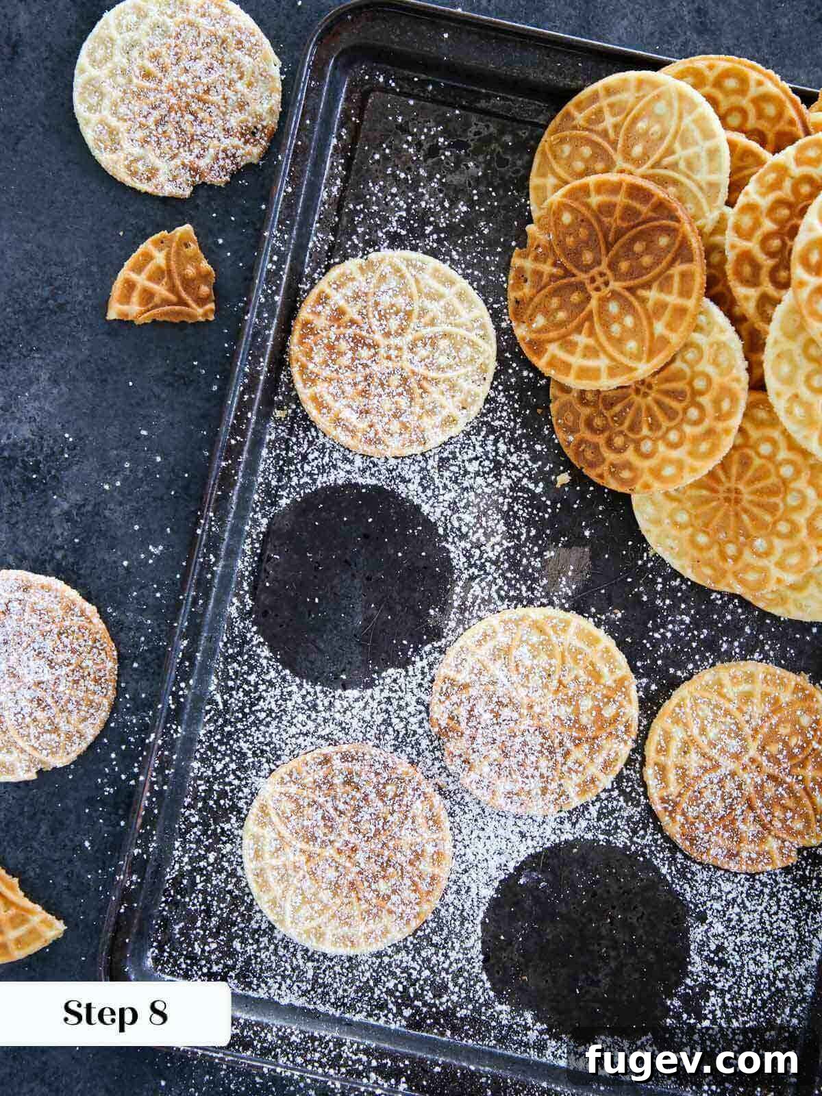 Sweet Italian Iron-Pressed Delights 11 A perfectly cooked pizzelle cookie, lightly dusted with powdered sugar.