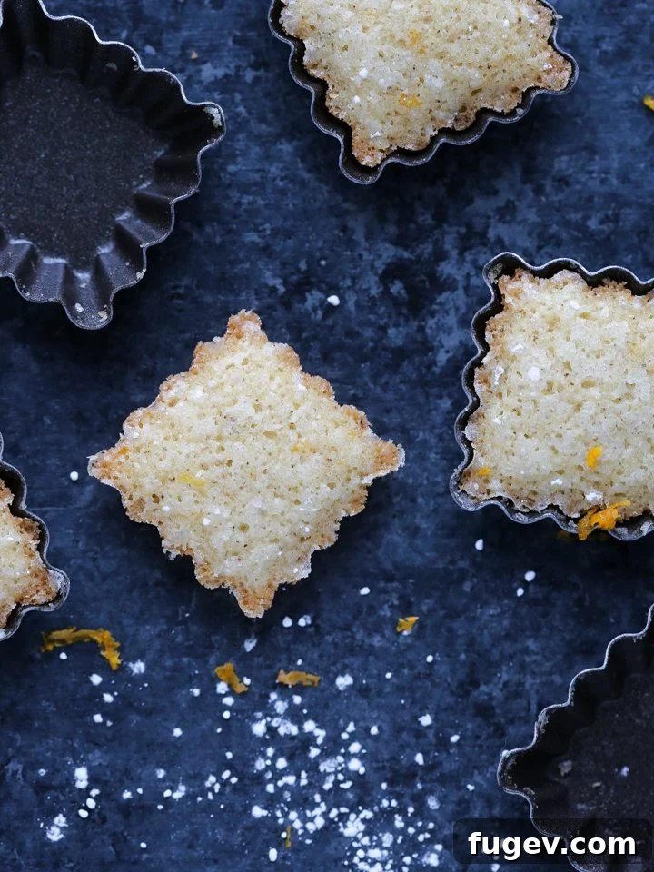 Zesty Orange Financiers 3 Close-up of golden Orange Financiers stacked