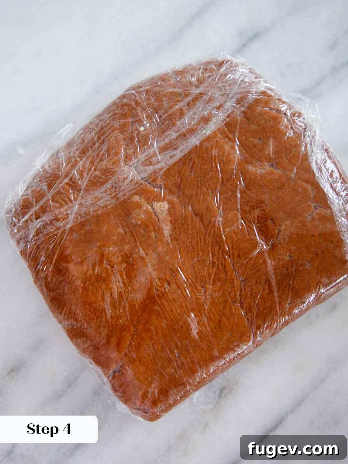 Holiday Spice Drops 8 dough wrapped in plastic wrap, ready for chilling.