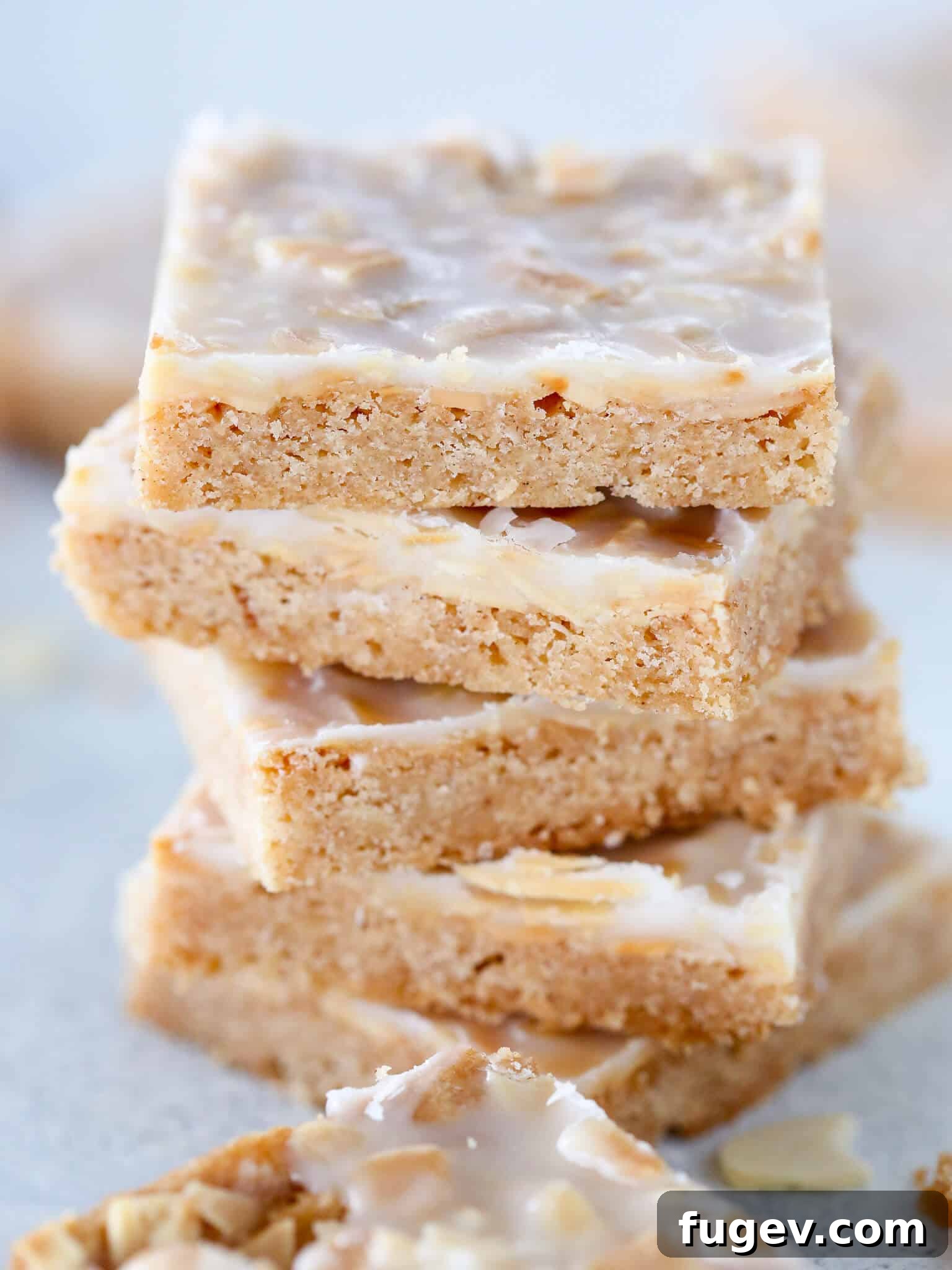 Golden Almond Squares 2 Crisp almond cookies stacked from the front.