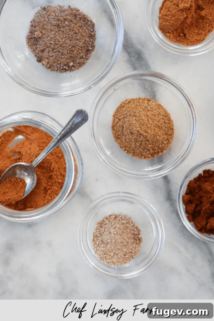 Homemade Speculoos Spice Blend 8 A close-up of the finely ground Speculoos Spice Mix in a ceramic bowl, showcasing its rich, warm color and inviting texture.