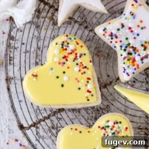 20 Festive Christmas Cookie Recipes 23 icing yellow heart shaped sugar cookies.