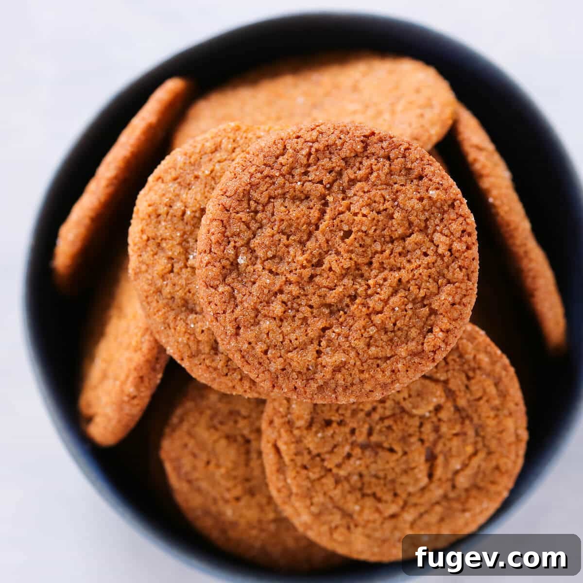 20 Festive Christmas Cookie Recipes 4 Old Fashioned Gingersnaps black bowl.