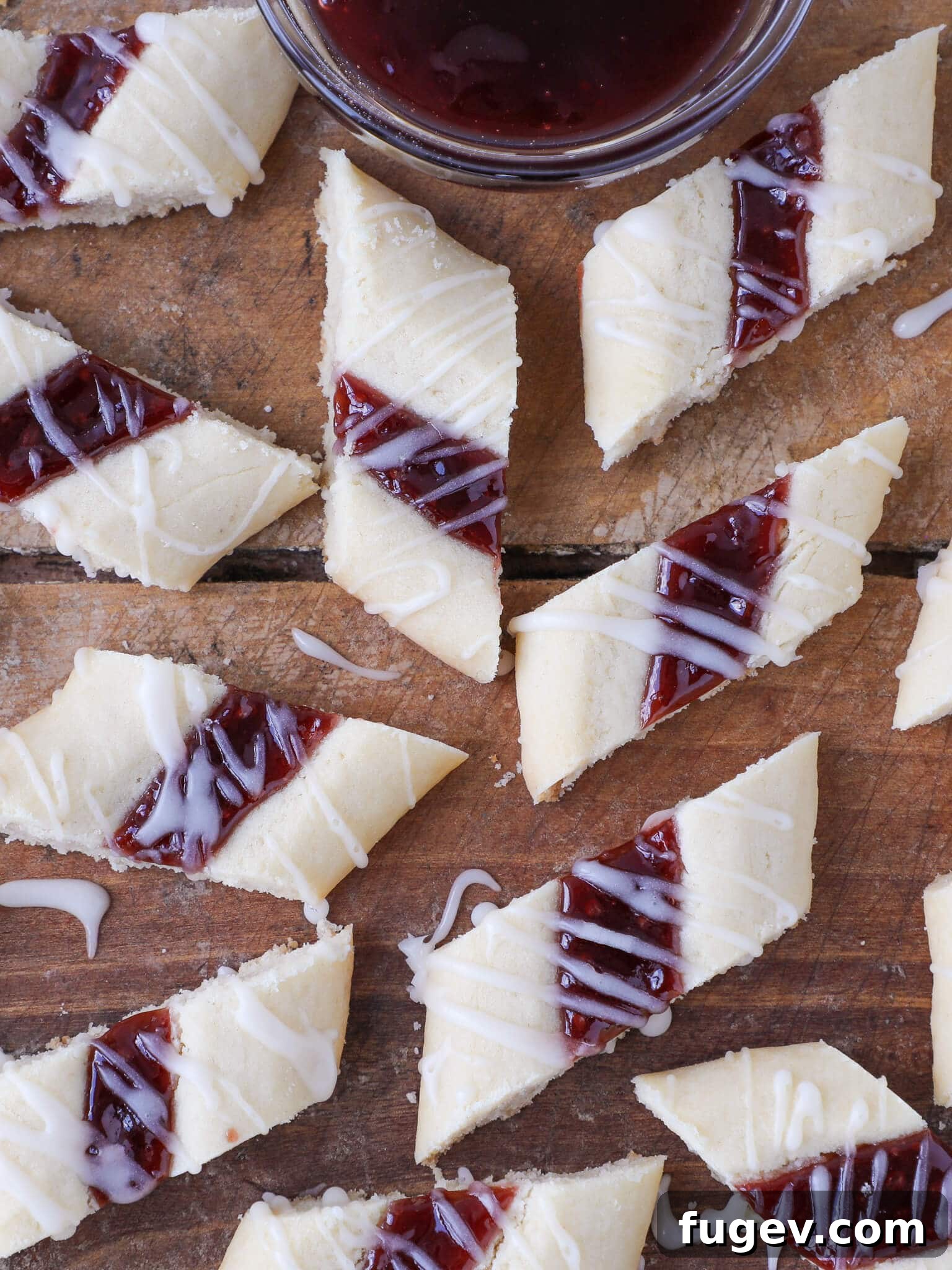 20 Festive Christmas Cookie Recipes 34 Danish Raspberry Ribbon Cookies Wooden Backdrop.