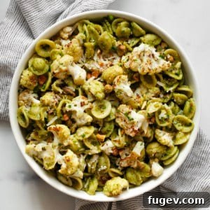 A smaller image of roasted cauliflower pasta with spinach pesto in a bowl, perfect for a recipe card thumbnail.