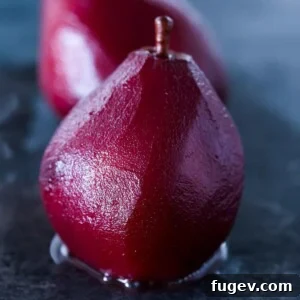 Red Wine Poached Pear from front served for Valentine's Day Desserts.