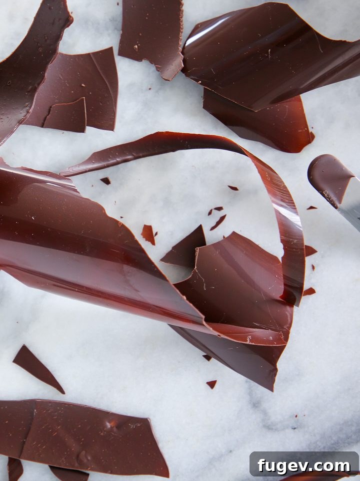 Ice Bath Tempering Your Dark Chocolate to Perfection 3 Tempering dark chocolate in a bowl over an ice bath